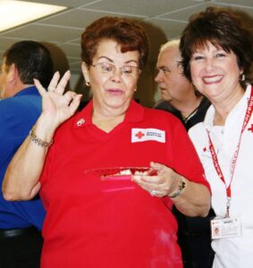 Red Cross volunteer pronounces recipe delicious